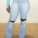 5New High Waist Solid Ripped Jeans