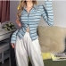 9Trendy Turndown Collar Striped Zipper Up T Shirts